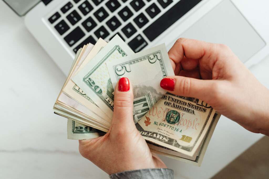 A woman counting money.