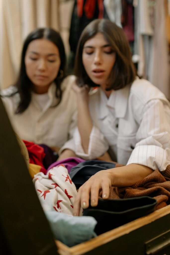 Women looking at clothing.