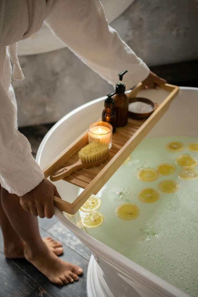 Woman placing bath tray on tub